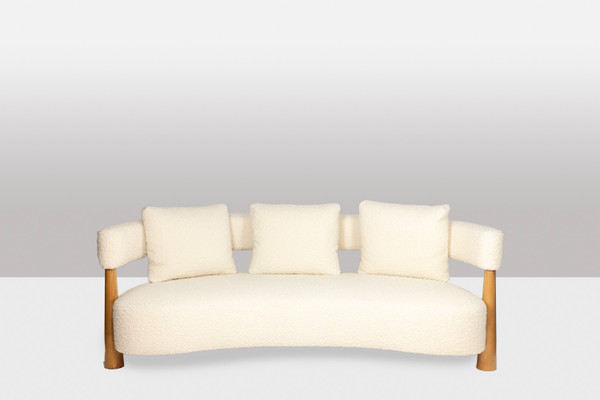 Bean-shaped 3-seater sofa in blond beech. Contemporary work.