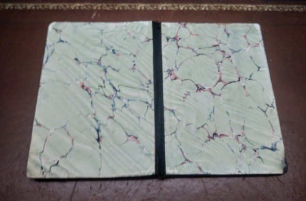 Face to hand, binder.