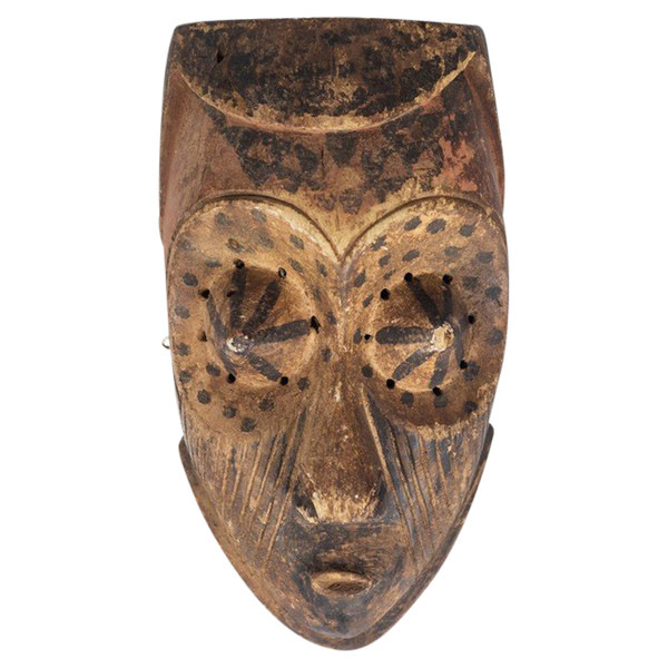 African "Kuba Babuka" mask in wood and pigments. 20th century.