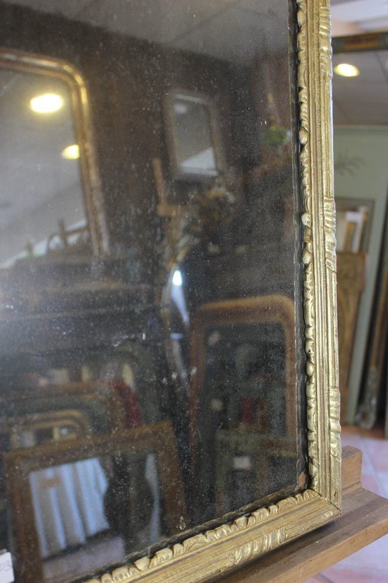 Louis XVI gilded wood mirror, mercury ice
