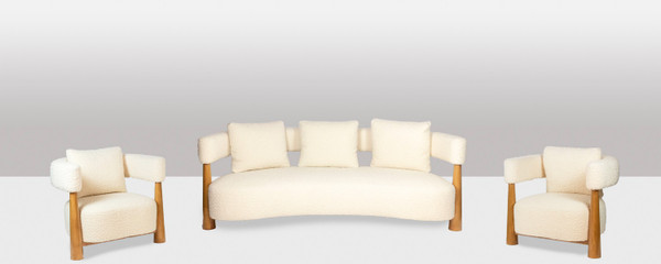 Pair of bean-shaped armchairs in blond beech. Contemporary work.