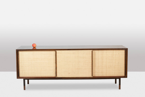 Sideboard in wenge, raffia and lacquered metal. 1970s.
