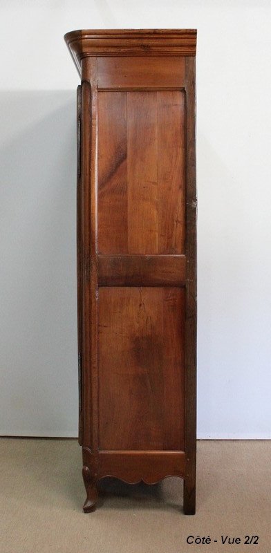  Bonnetière en Merisier massif, style Louis XV - Début XIXe 