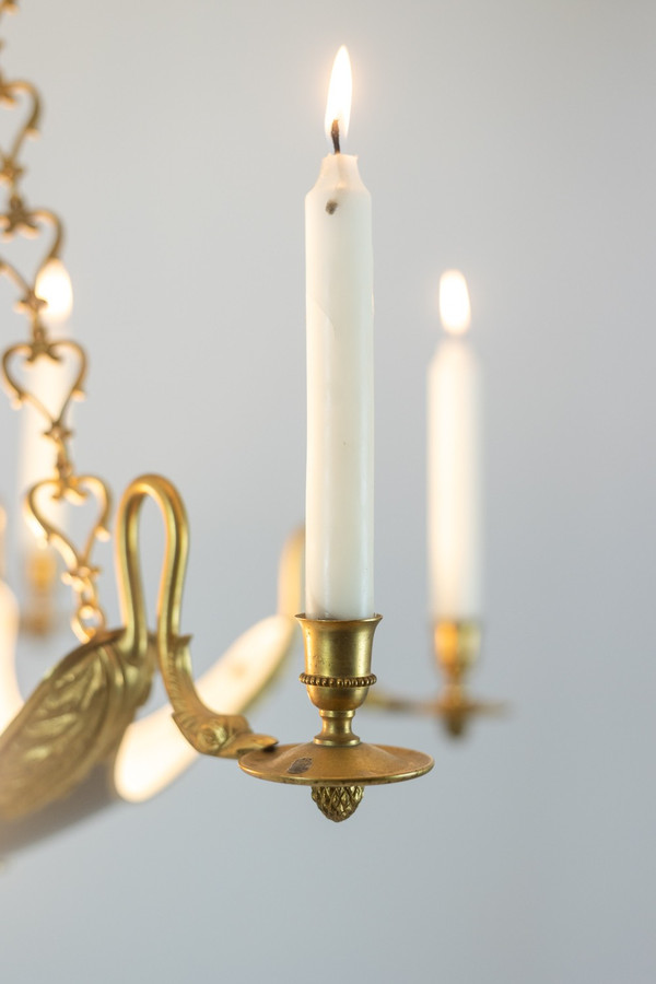 Casa Baguès. Lampadario in bronzo dorato stile impero. 1950 circa.