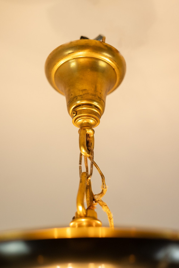 Casa Baguès. Lampadario in bronzo dorato stile impero. 1950 circa.