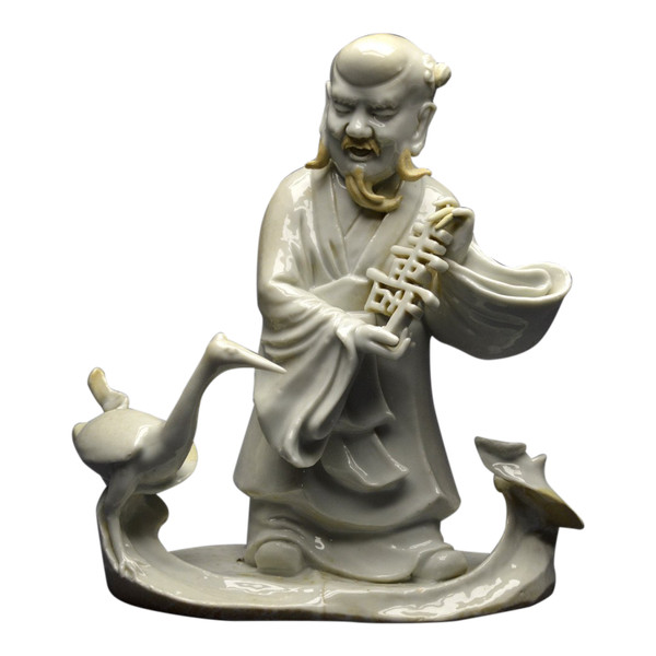 China, 18th century, Chinese white porcelain group depicting the Taoist god Shoulao