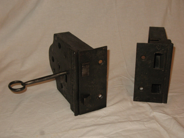 Wrought iron fortified house lock with key 18th century total length: 41 cm
