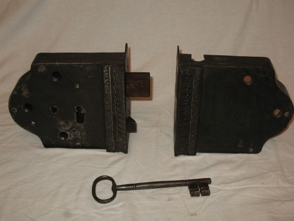 Wrought iron fortified house lock with key 18th century total length: 41 cm