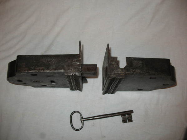 Wrought iron fortified house lock with key 18th century total length: 41 cm