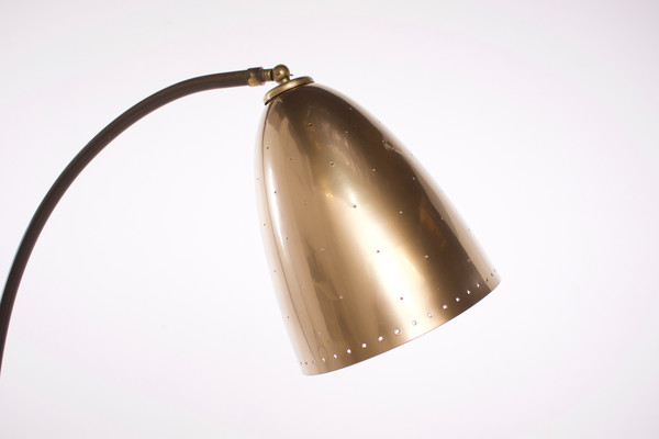 Modernist floor lamp in the Paavo Tynell style.