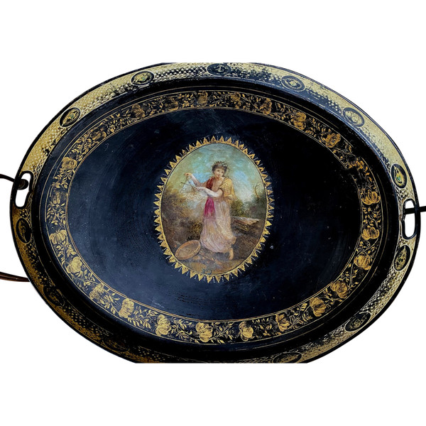 Exceptional large Napoleon III tray, oval painted sheet metal, decorated with gilded friezes and a painted scene.