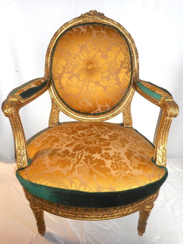 Suite Of Four Large Armchairs Early 19th Century In Gilded Wood