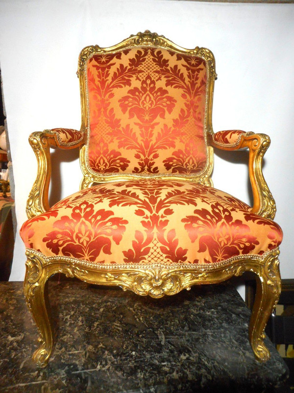 Set di quattro poltrone in legno dorato del XIX secolo