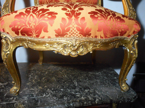 Set di quattro poltrone in legno dorato del XIX secolo