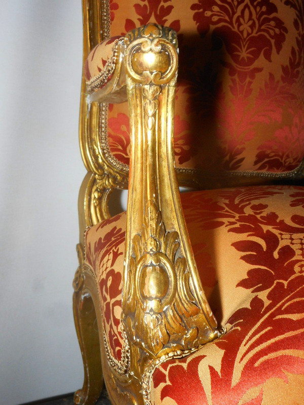Set di quattro poltrone in legno dorato del XIX secolo