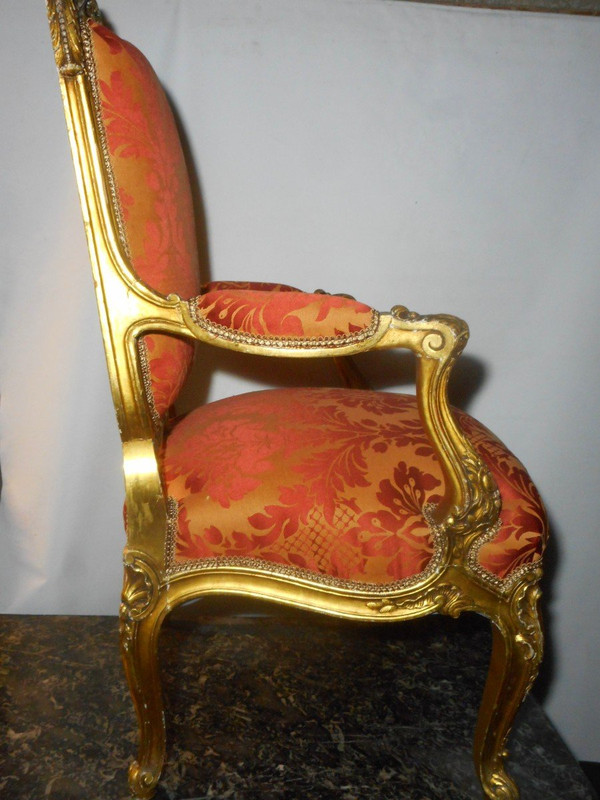 Set di quattro poltrone in legno dorato del XIX secolo