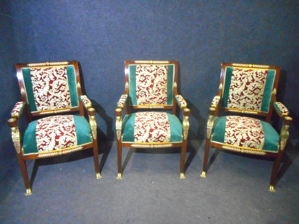 Serie di poltrone di epoca impero in mogano e bronzo dorato