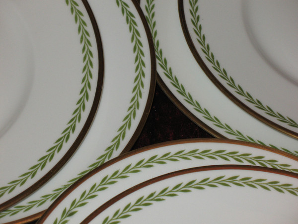 Porcelain service decorated with laurel friezes, Empire style, early 20th century.