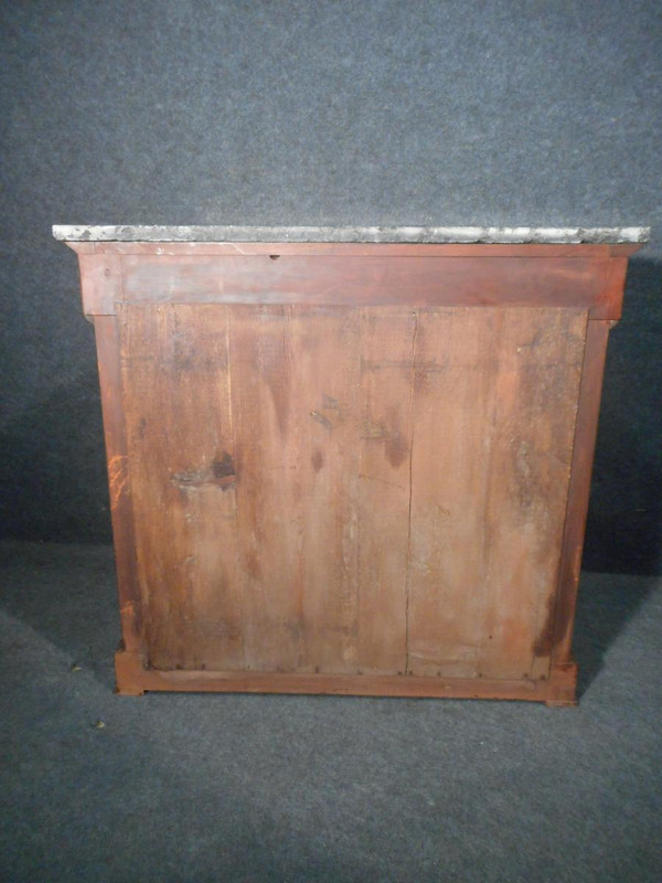 Coppia di console in mogano primo impero e cariatidi in bronzo dorato attribuite a Jacob