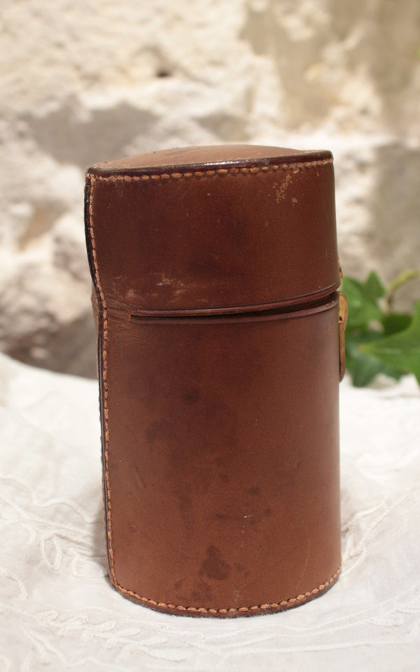 4 large bottles in leather case early 20th century