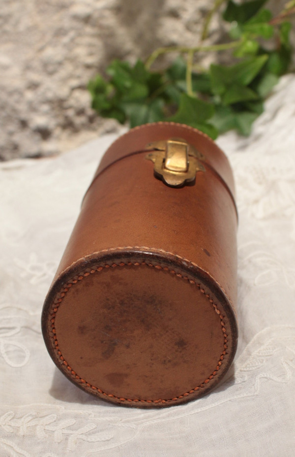 4 large bottles in leather case early 20th century