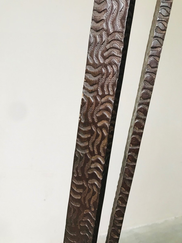 Art Deco wrought-iron floor lamp with flower design, circa 1930.