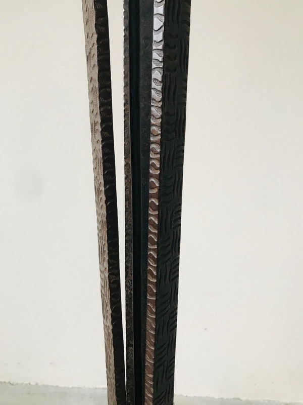 Art Deco wrought-iron floor lamp with flower design, circa 1930.
