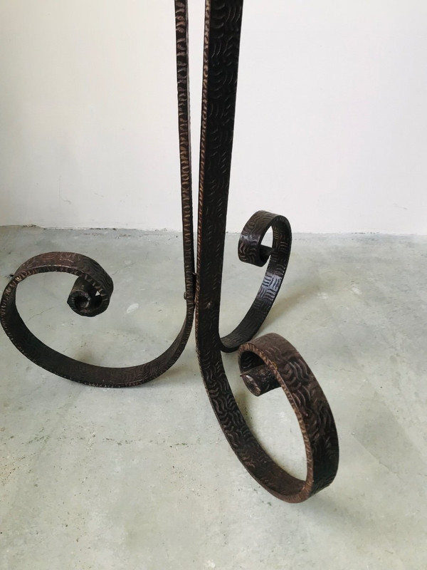 Art Deco wrought-iron floor lamp with flower design, circa 1930.