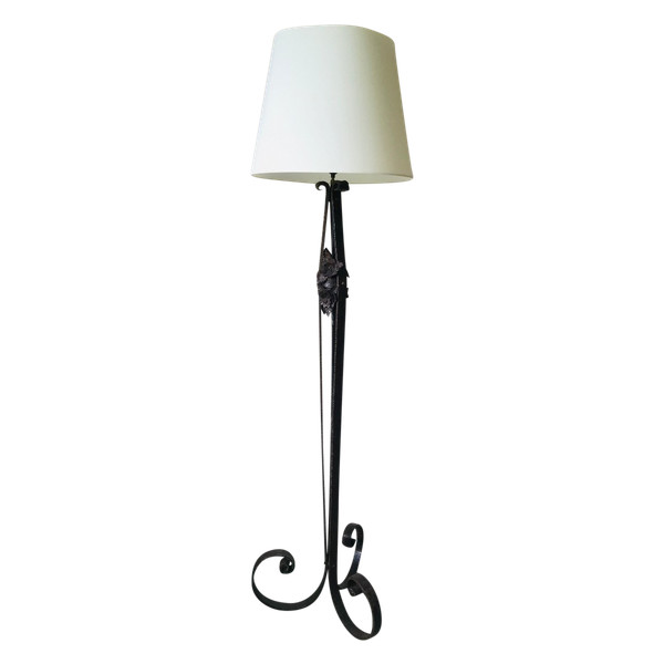 Art Deco wrought-iron floor lamp with flower design, circa 1930.