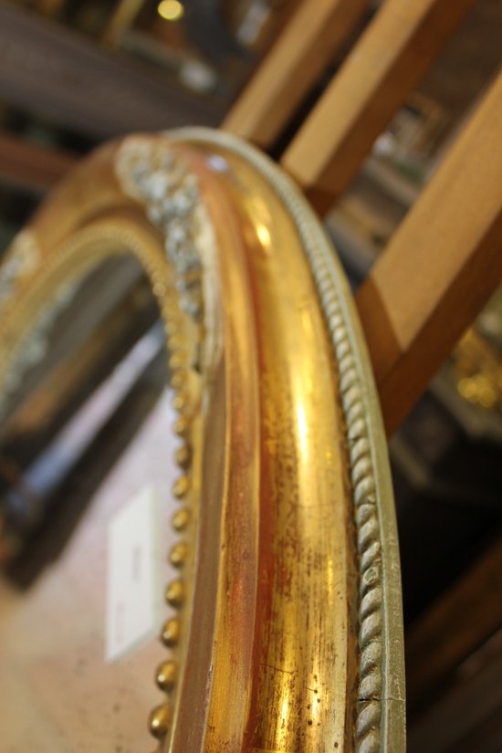 Alte ovale Spiegelrestaurierung Blattgold und Patina