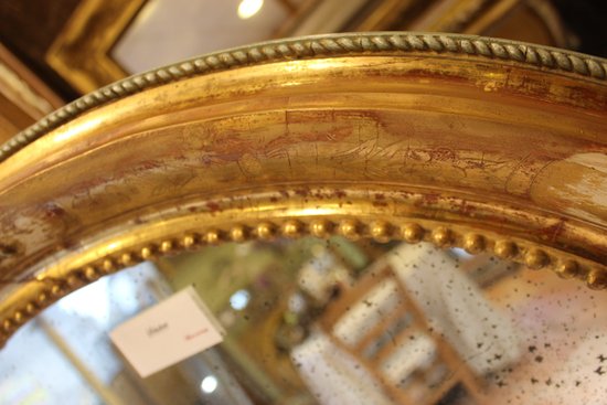 Alte ovale Spiegelrestaurierung Blattgold und Patina