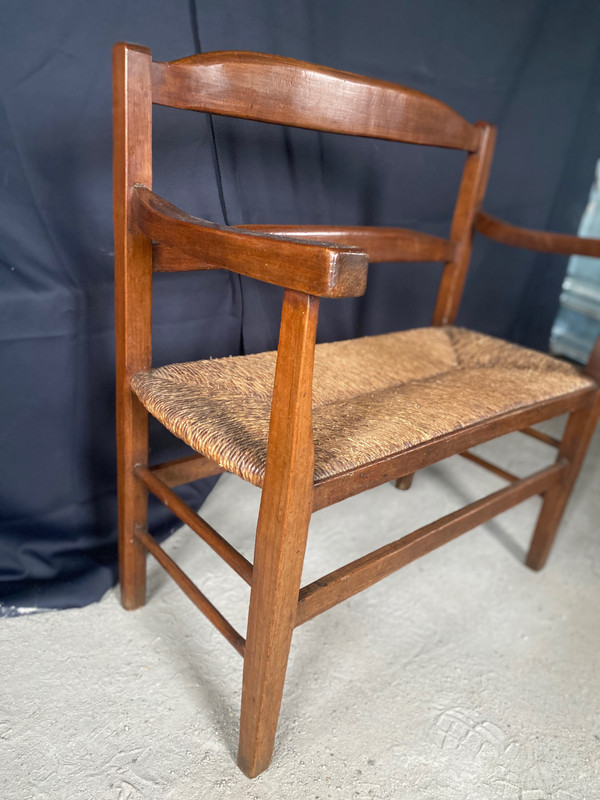 Fireplace bench with backrest dating from the 19th century