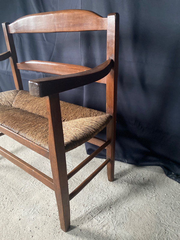 Fireplace bench with backrest dating from the 19th century