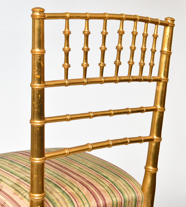 Pair of bamboo-style gilded wood chairs