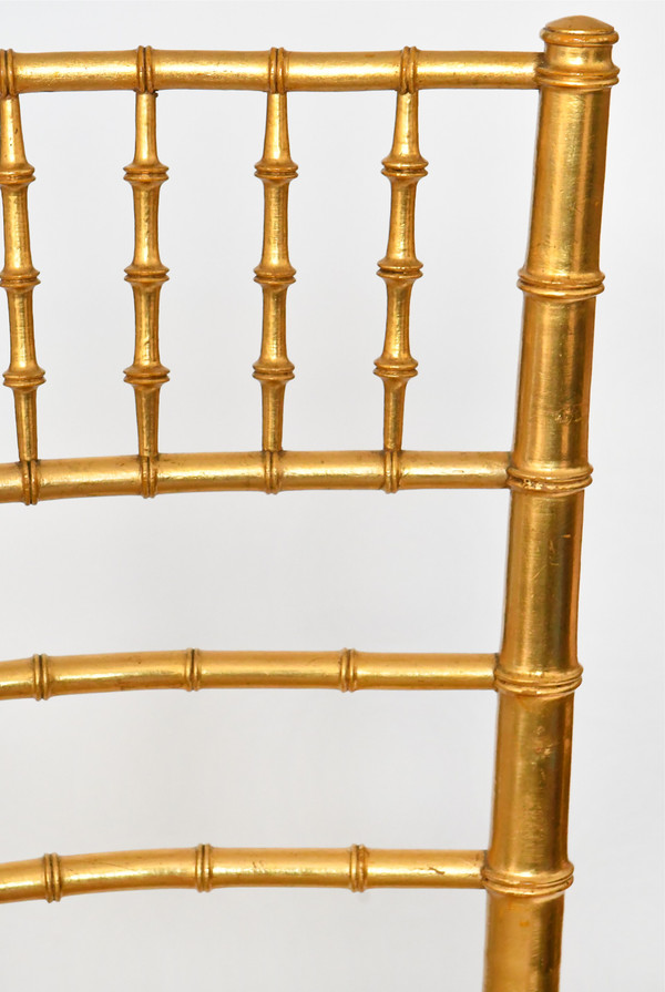 Pair of bamboo-style gilded wood chairs