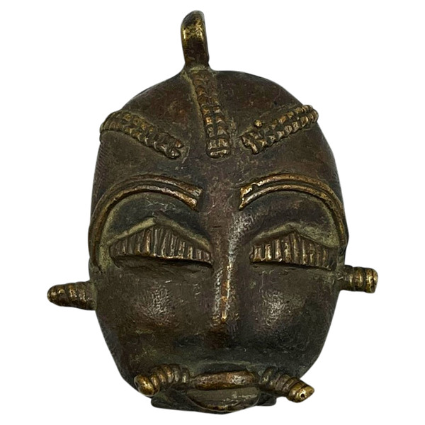 Petite MASQUETTE PENDENTIF - Culture Baoulé, Côte d’Ivoire - Première moitié du XXème siècle 