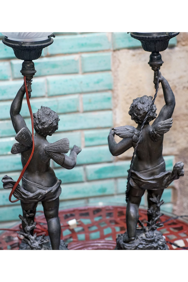 ANGES, "CHARMEUR" et "VAINQUEUR", par Ernest RANCOULET, paire de lampes flammes, régule