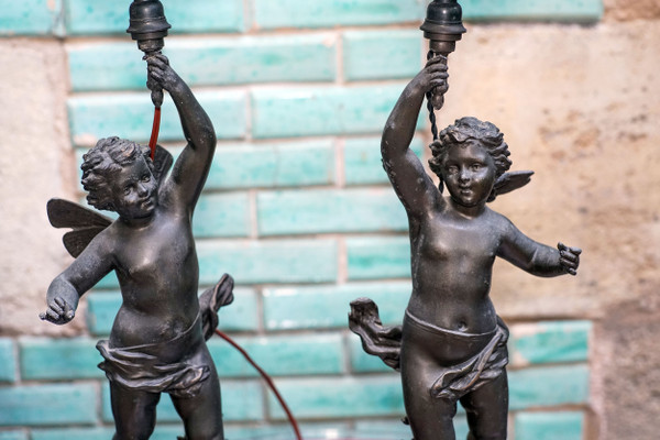 ANGES, "CHARMEUR" et "VAINQUEUR", par Ernest RANCOULET, paire de lampes flammes, régule