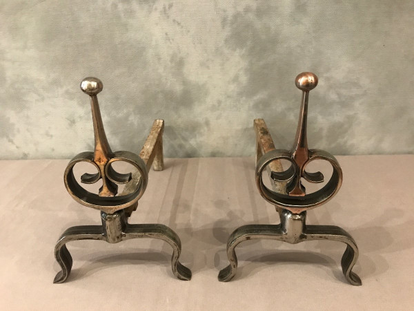 Pair of antique polished cast iron andirons, 20th century