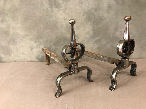 Pair of antique polished cast iron andirons, 20th century
