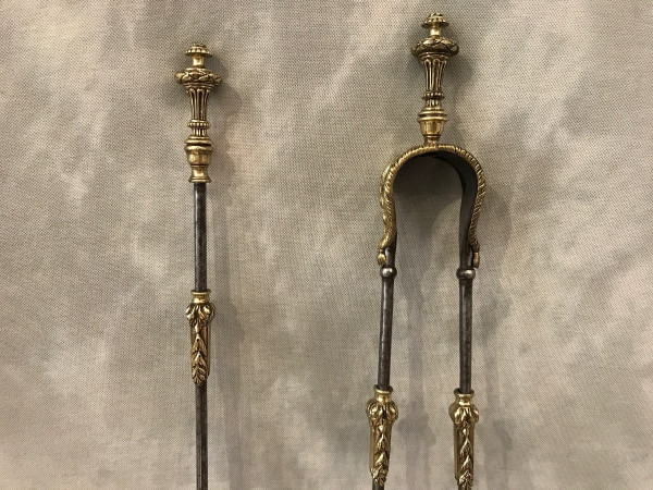 Set of an iron and bronze shovel and tongs, 19th century