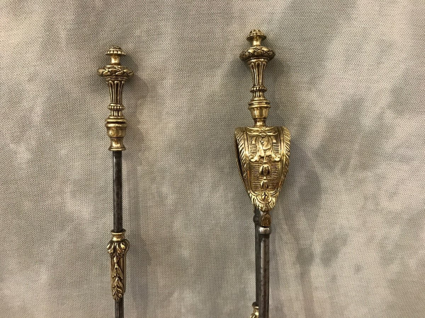 Set of an iron and bronze shovel and tongs, 19th century