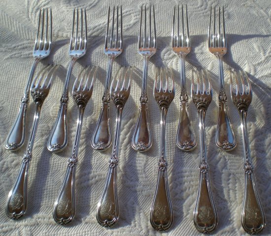 12 solid silver dessert cutlery