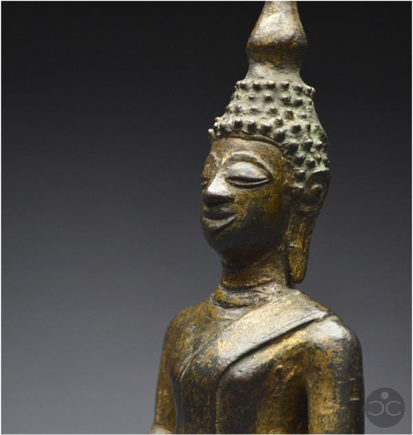 Laos, 18th century, Buddha in bumisparsha mudra position, Old lacquered and gilded bronze