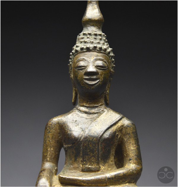 Laos, 18th century, Buddha in bumisparsha mudra position, Old lacquered and gilded bronze