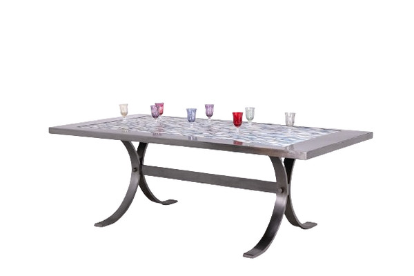Dining room table in polished metal and ceramic. 1970s.