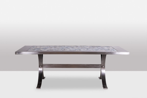 Dining room table in polished metal and ceramic. 1970s.
