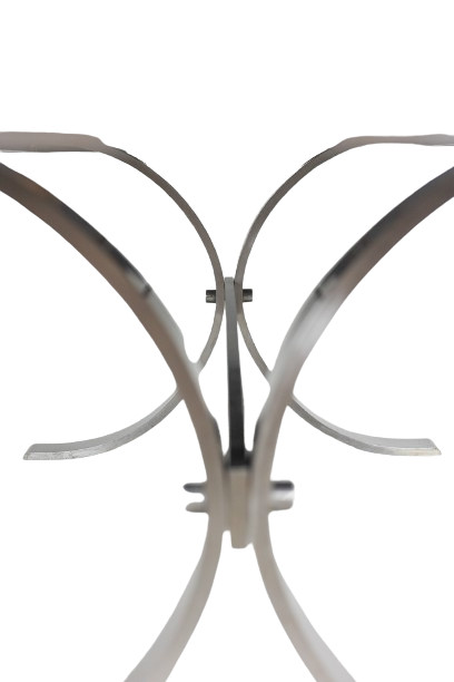 Dining room table in polished metal and ceramic. 1970s.