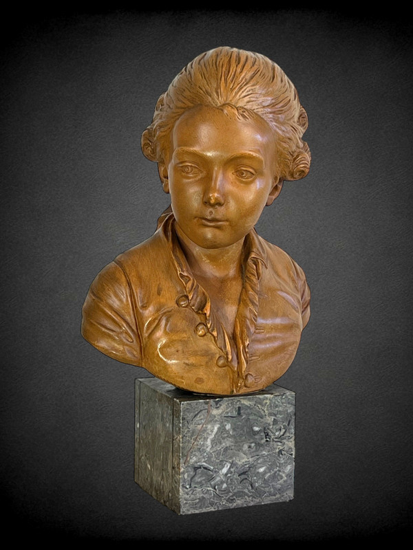 BUSTO DI BAMBINO SECONDO SOGGETTO "PAJOU" IN TERRACOTTA SU BASE IN MARMO