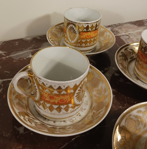 Paris, Revolution or Empire period - suite of 4 litron cups and saucers - rich gilded decoration and nankin background